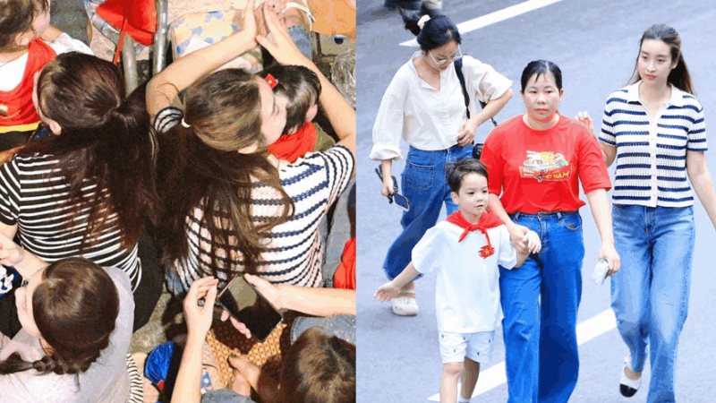 Mẹ con Hoa hậu Đỗ Mỹ Linh và 2 cháu nội Bầu Hiển gây sốt khi xếp hàng xem diễu binh, netizen xót xa: Dư sức ngồi chỗ ngon, sao lại phải chen lấn vất vả vậy?
