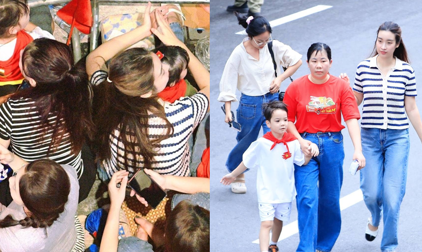 Mẹ con Hoa hậu Đỗ Mỹ Linh và 2 cháu nội Bầu Hiển gây sốt khi xếp hàng xem diễu binh, netizen xót xa: Dư sức ngồi chỗ ngon, sao lại phải chen lấn vất vả vậy?