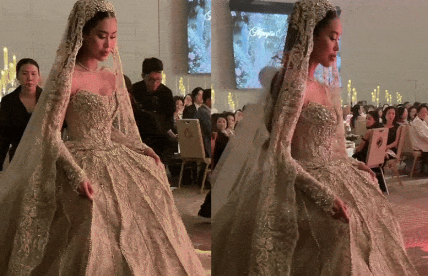 Khoảnh khắc Tiên Nguyễn vất vả ‘bê’ bộ váy 30kg đính nghìn viên đá quý trong tiệc cưới đến mức mất luôn vẻ tự tin: Sao phải kh:ổ vậy chời!